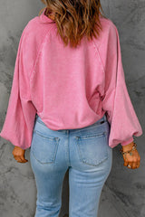 Floated pink sweatshirt with pimples and lantern sleeves