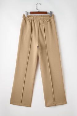 Pantalon large taille haute avec cordon de serrage et coutures apparentes gris fumée