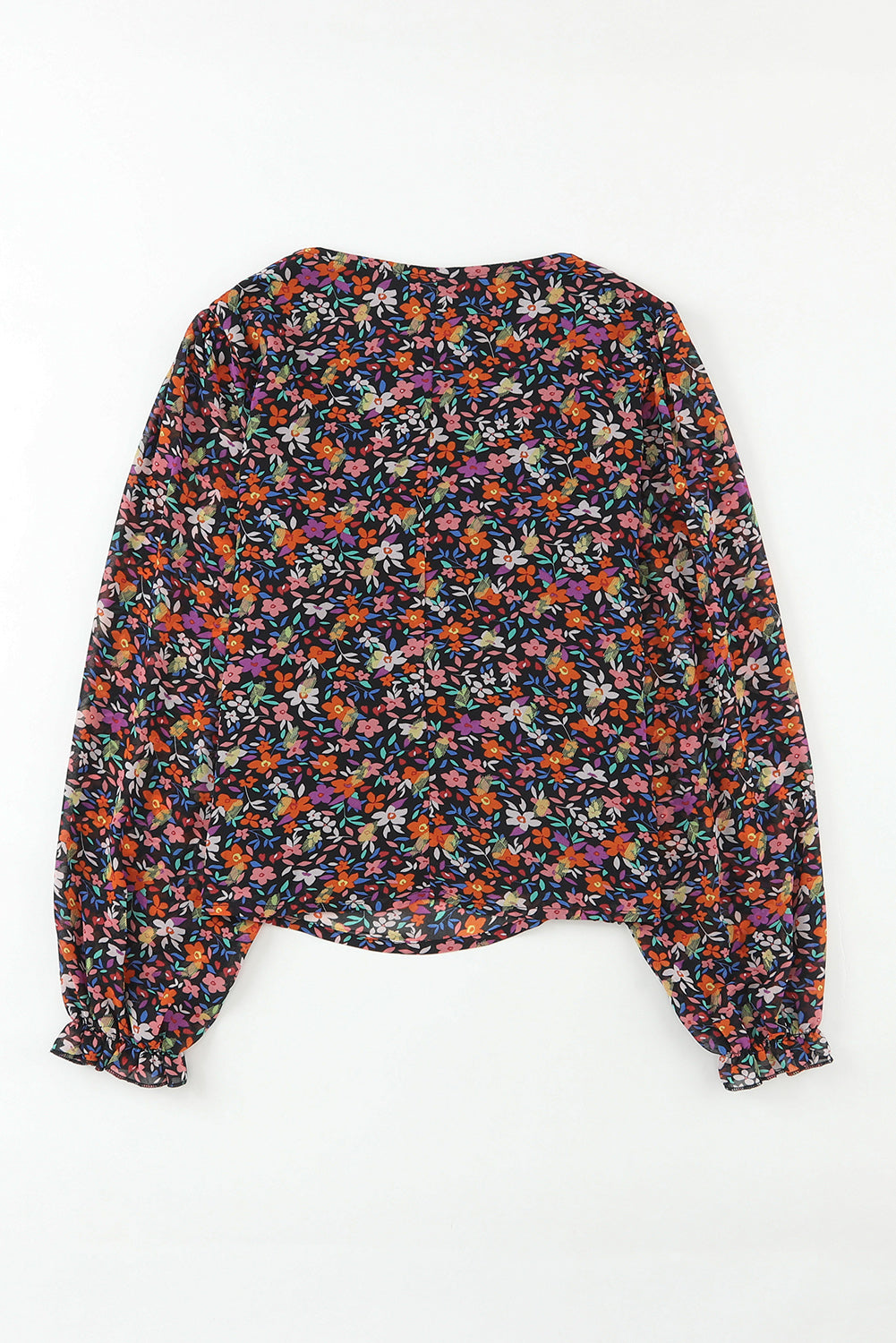 Blouse florale noire à col en V et manches bouffantes