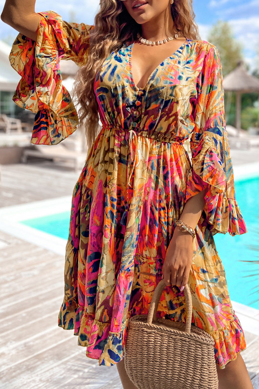 Robe fluide rose à manches évasées *