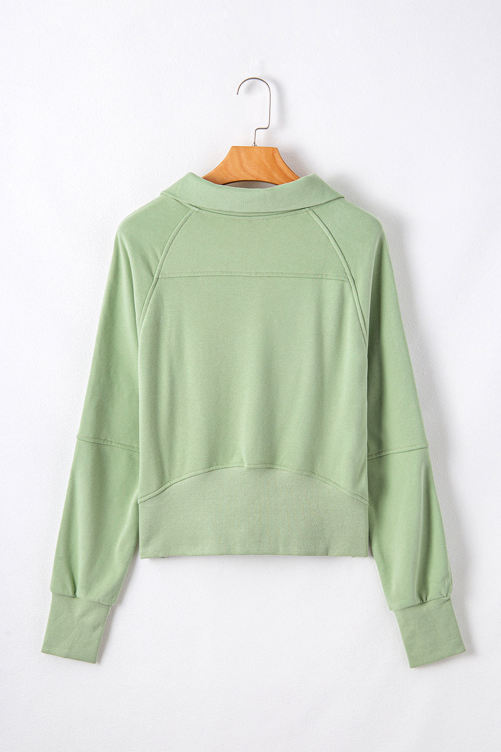 Smoke green sweatshirt with kangaroo pocket and stand-up collar with quarter zip