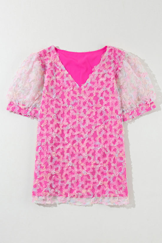 Blouse with short puffs in bonbon flowery knit