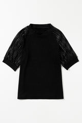 Black ribbed t-shirt with striped and round-colored mesh sleeves