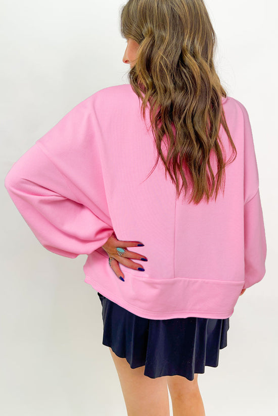 Amplia sudadera con boutheter rosa unido