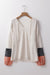 Blusa beige con cordón apretado *