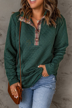 Green sweatshirt with geometric texture and plaid border