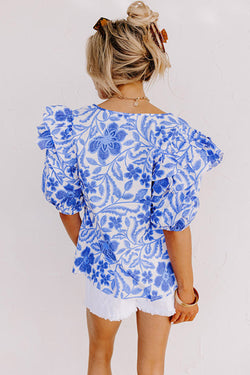 Blusa azul oscuro con estampado floral *