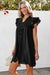 Vestido recto negro con volantes *