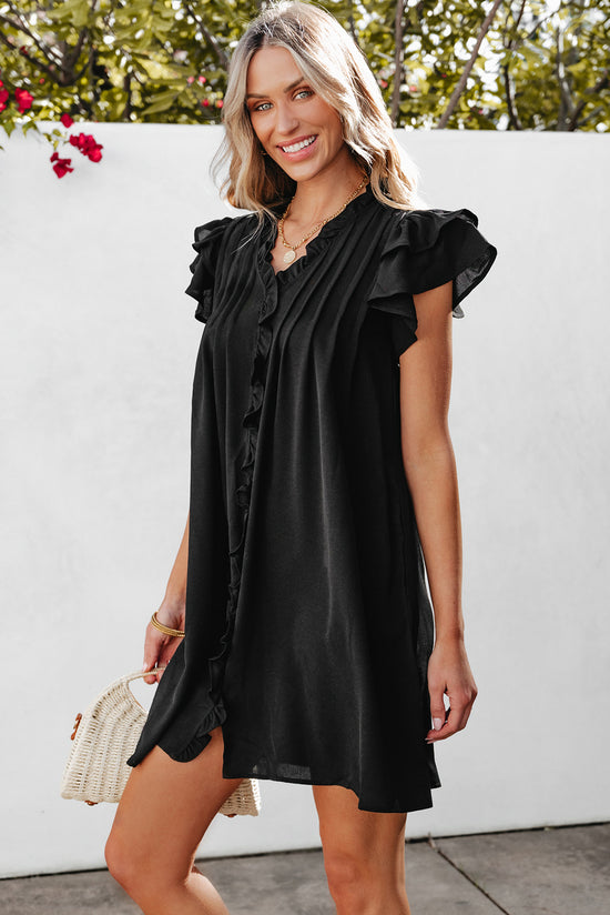 Vestido recto negro con volantes *