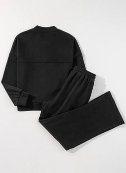 Ensemble veste zippée noire à coutures unies et pantalon à taille avec cordon de serrage