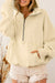 Beige zip-up hoodie with kangaroo pocket and ribbed trim