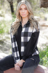 Black checkerboard patchwork collared top with exposed seams