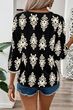 Blusa negra con impresión geométrica vintage *