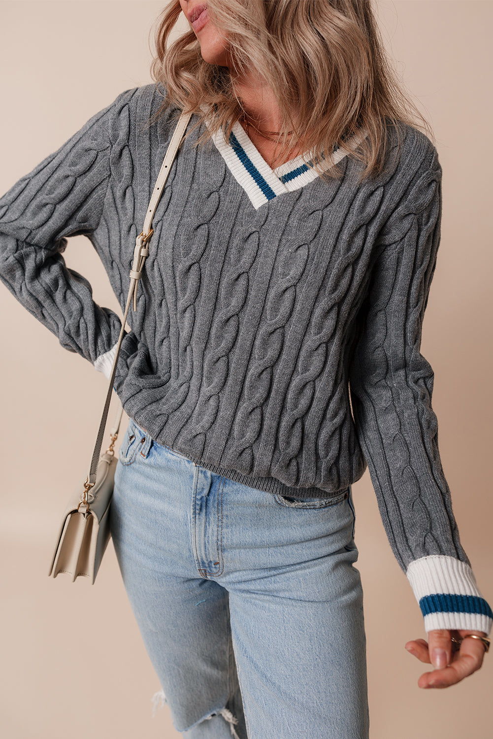 Cable knit v-neck sweater with contrasting ribbed cuffs in medium grey