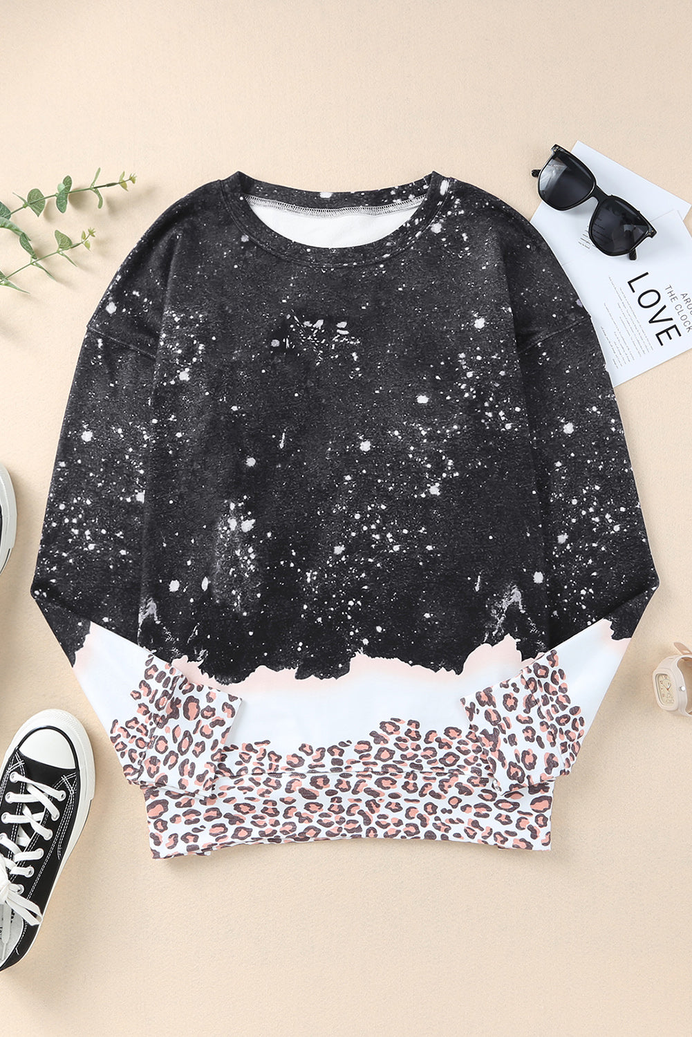 Spaccatura pullover sbiancata leopardata nera