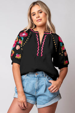 Black textured blouse with puffy sleeves and Ricrac floral embroidery