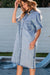 Light blue chambray shirt dress with short sleeves and medium washing