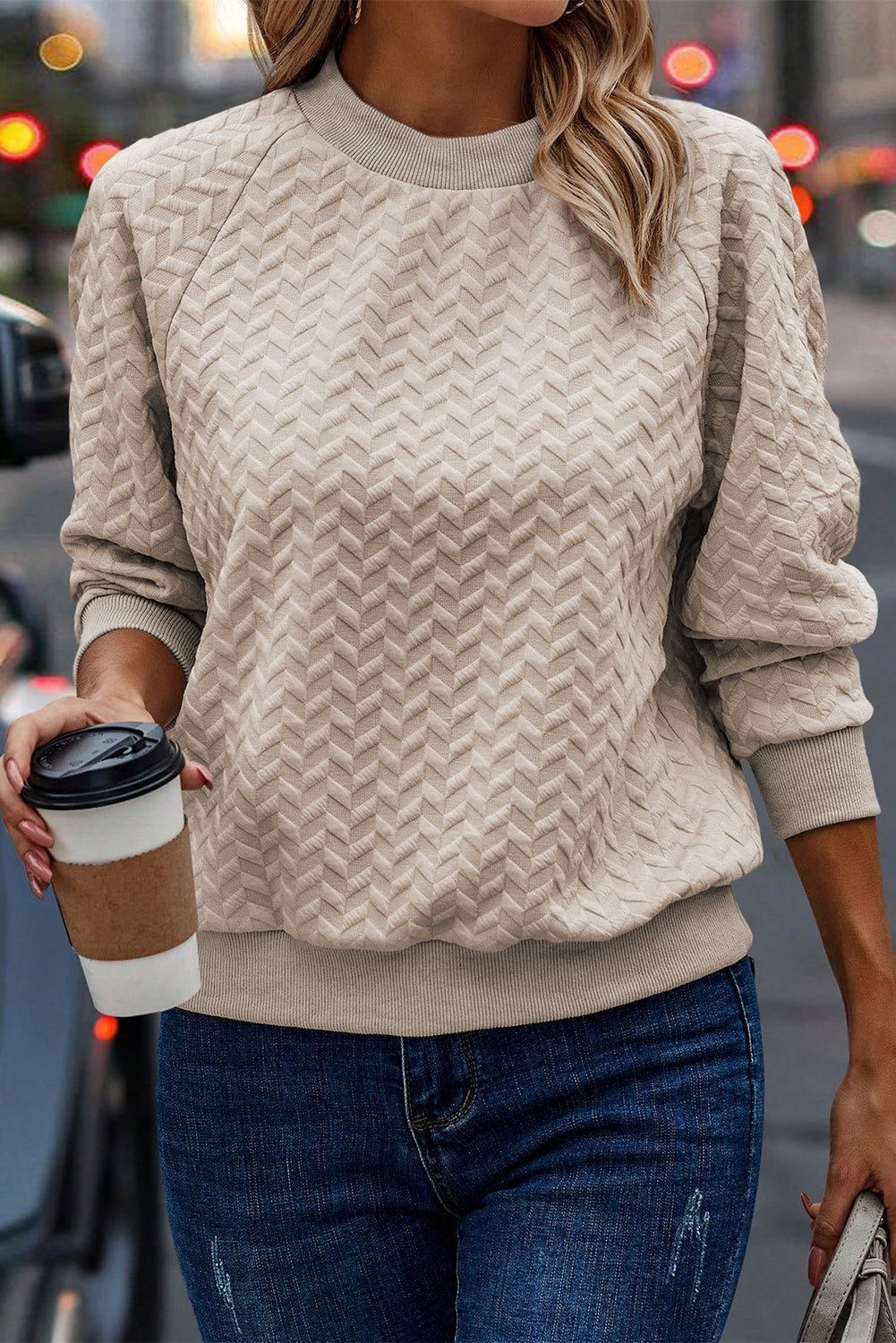 Sudadera beige texturizada une con manga raglán