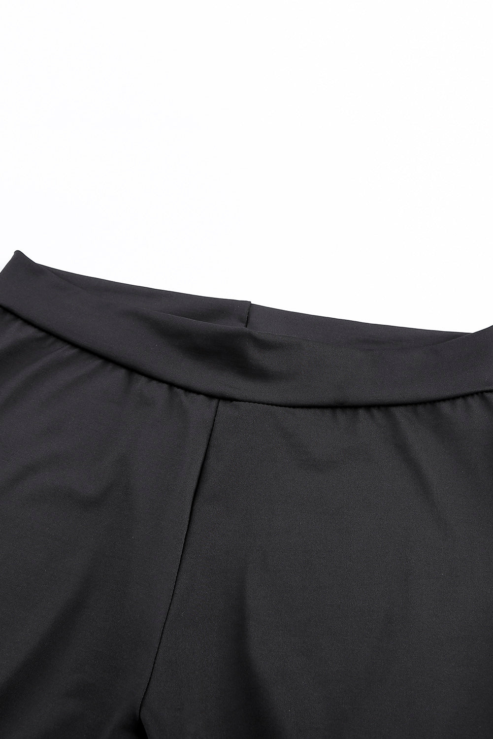 Legging de lacet de grommet noir à l'avant