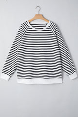 Sweat-shirt ample à rayures noires, manches raglan, fentes latérales