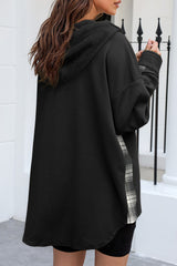 Veste à capuche noire en tricot gaufré à carreaux et patchwork avec cordon de serrage