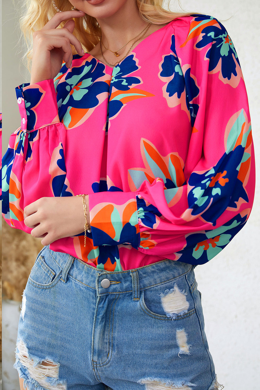 Blouse à manches bouffantes et imprimé fleurs roses