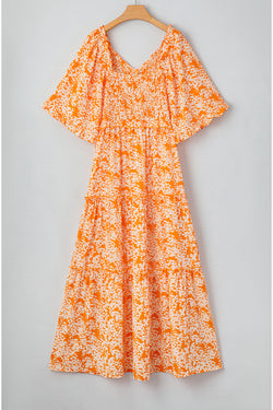 Robe longue smockée à imprimé floral orange*