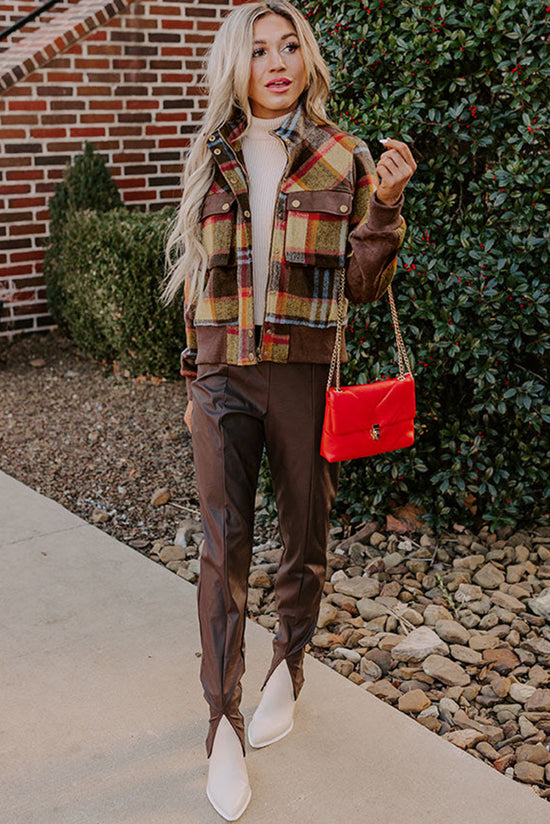 Brown jacket with printed tiles with chest pockets and buttons zipper and upright collar