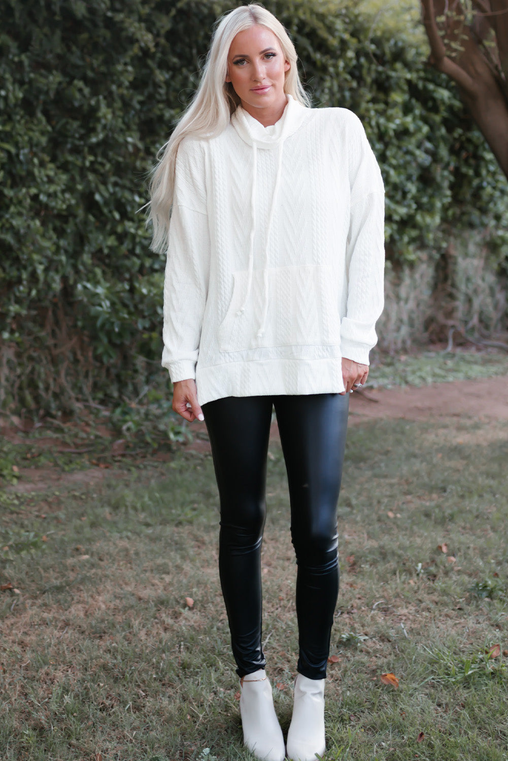 White textured sweatshirt at housing collar