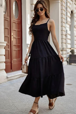 Robe longue noire croisée dos nu avec corsage à plusieurs niveaux