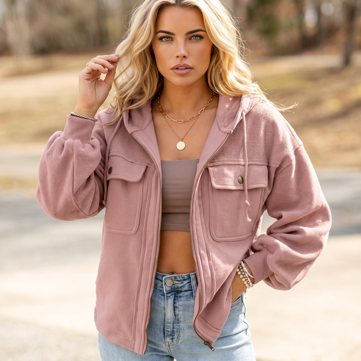 Veste rose à capuche zippée avec cordon de serrage