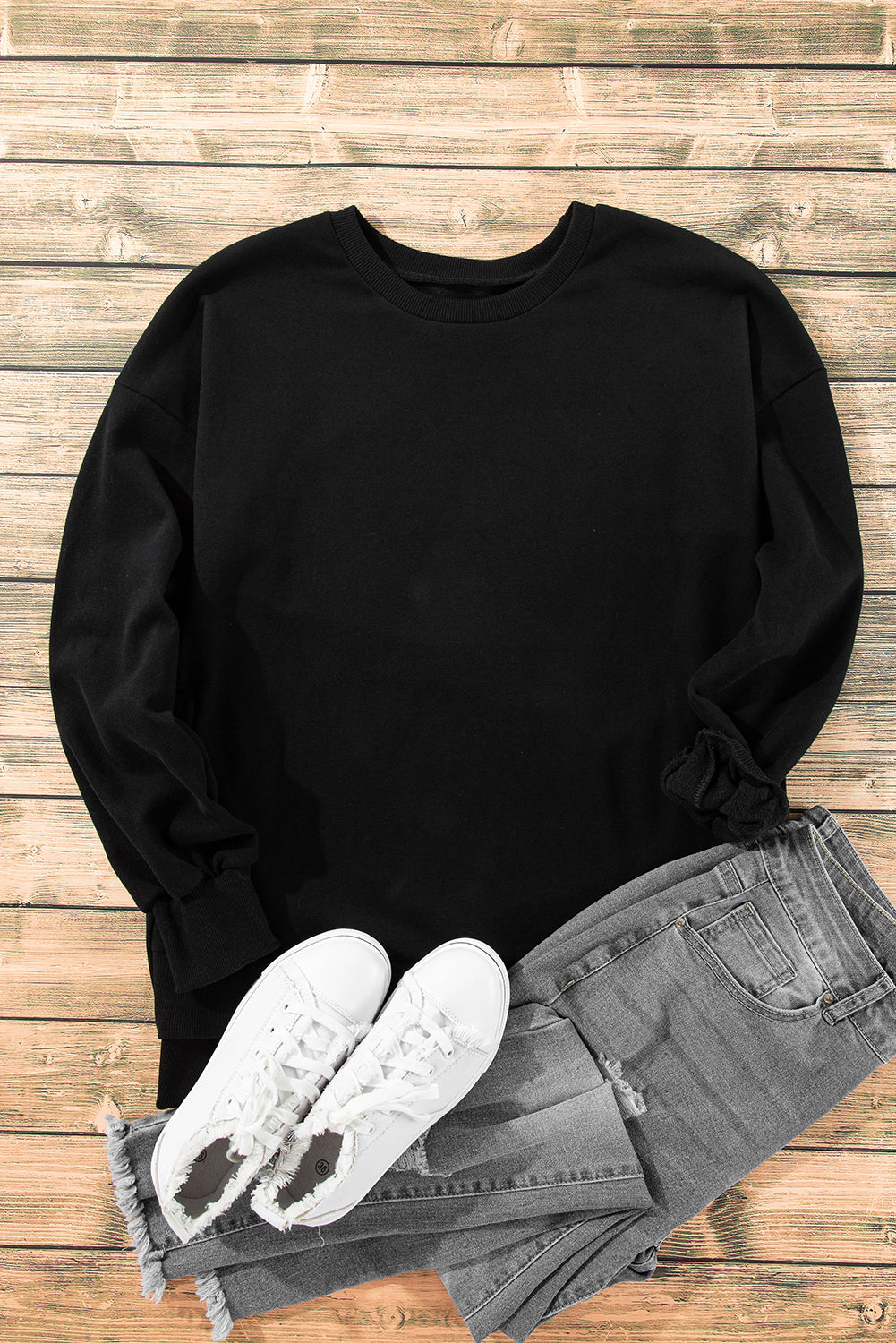 Sudadera negra unida con hombros caídos y forro de vellón