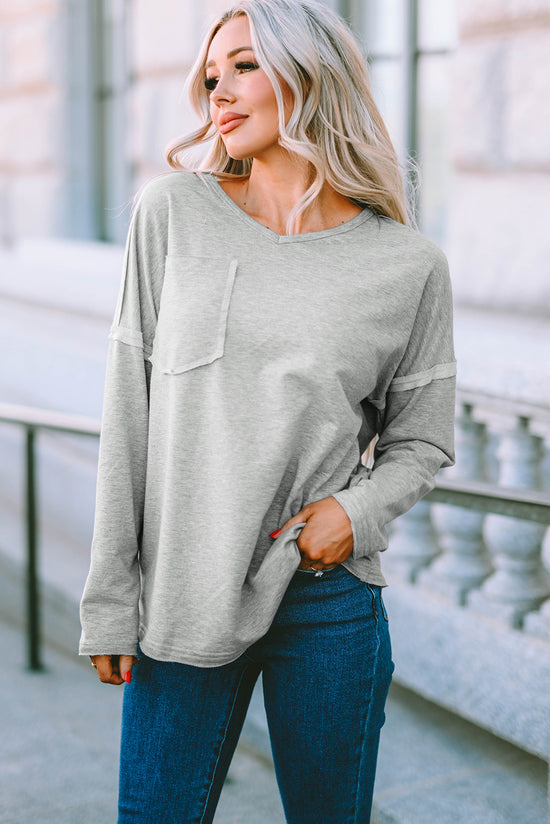 Grey oversized top with pockets and dropped sleeves