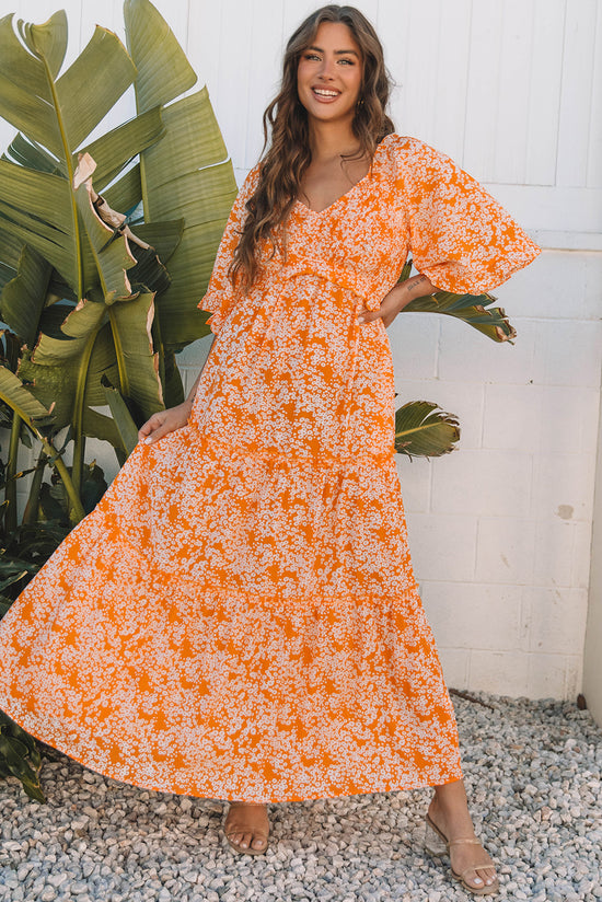 Robe longue smockée à imprimé floral orange*