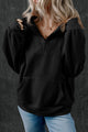 Black zip-up sweatshirt with stand-up collar and kangaroo pocket