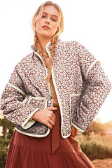 Rose -collar pink jacket with contrasting pockets and edges with floral print