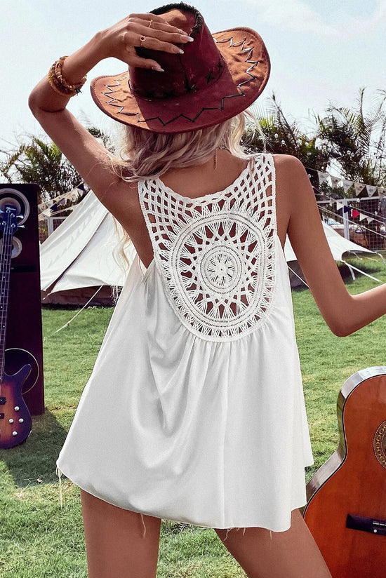 Sleeveless white tunic *