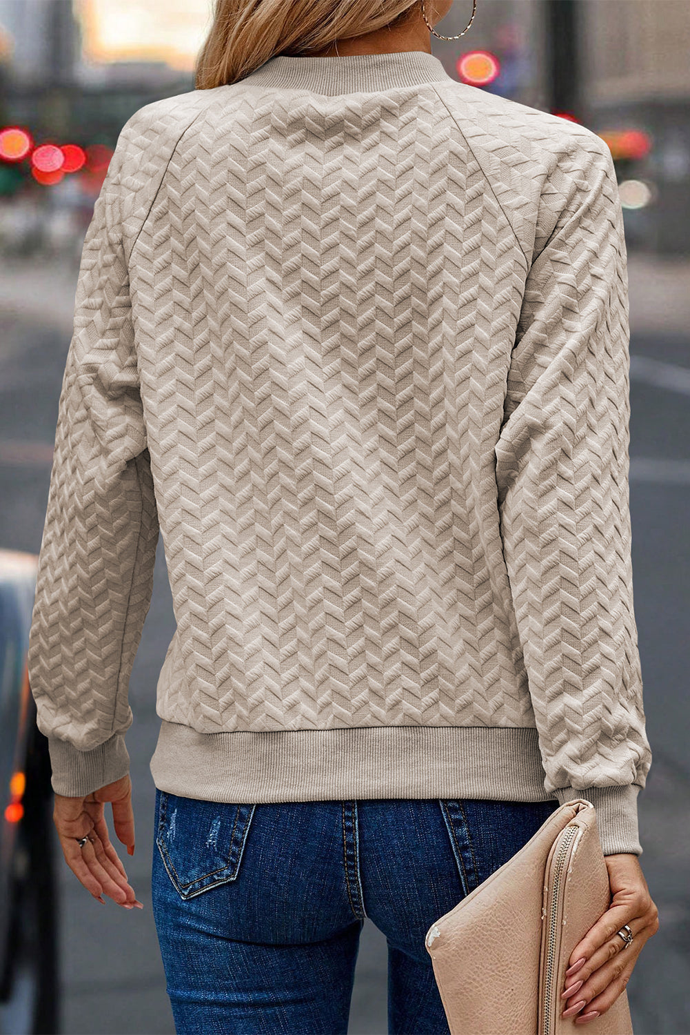 Sudadera beige texturizada une con manga raglán