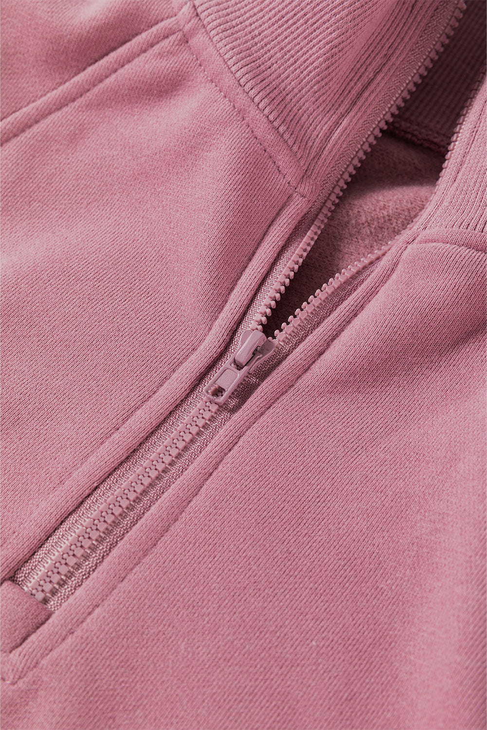 Sweat-shirt fushia à col zippé et épaules tombantes