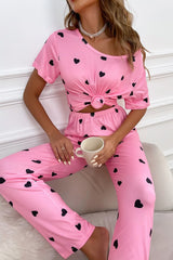 Ensemble de détente rose avec t-shirt et pantalon à imprimé cœur pour la Saint-Valentin-A WOMAN WE LOVE