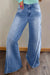 Jeans acampanados con dobladillo crudo con costuras vintage hermosa azul