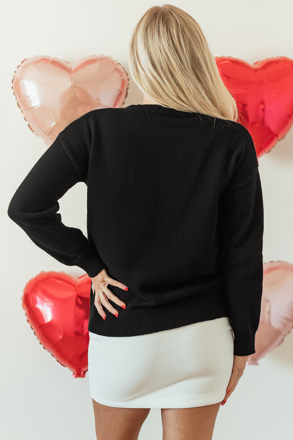Pull décontracté à col rond imprimé pailleté XOXO noir