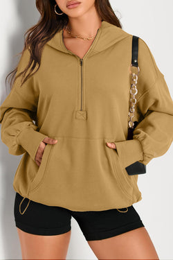 Sweat with slumped brown oversized hooded with kangaroo pocket and semi-ferms lightning