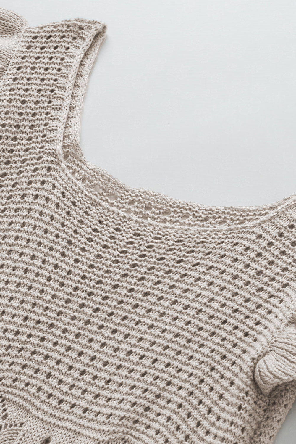 Pull à manches de manche en tricot de poige.