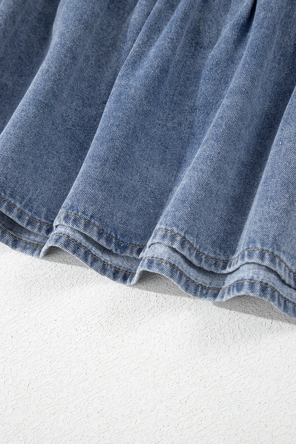 Mini-robe en jean bleu crépuscule avec poches latérales *