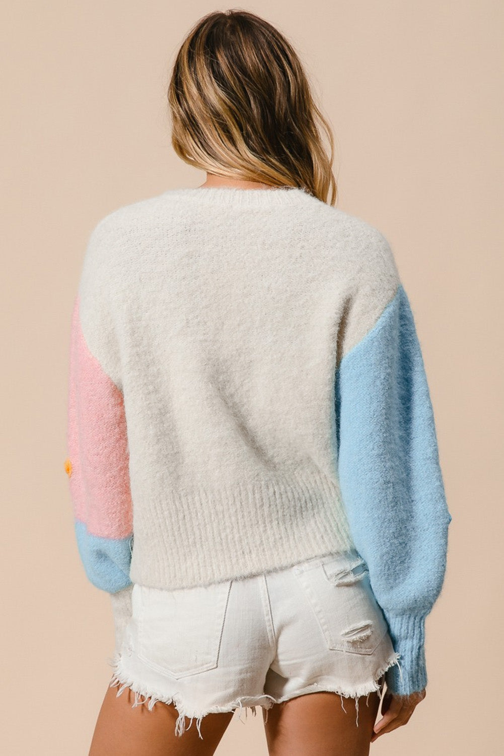 Multicolored sweater with dropped shoulders and multicolored floral embroidery