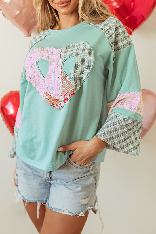 Large high with long sleeves clearly aqua plaid floral peace heart graphic