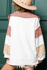 Loose-fitting white plaid top with exposed seams, V-neck