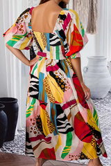 Long white bohemian dress with abstract and smocked print in square collar