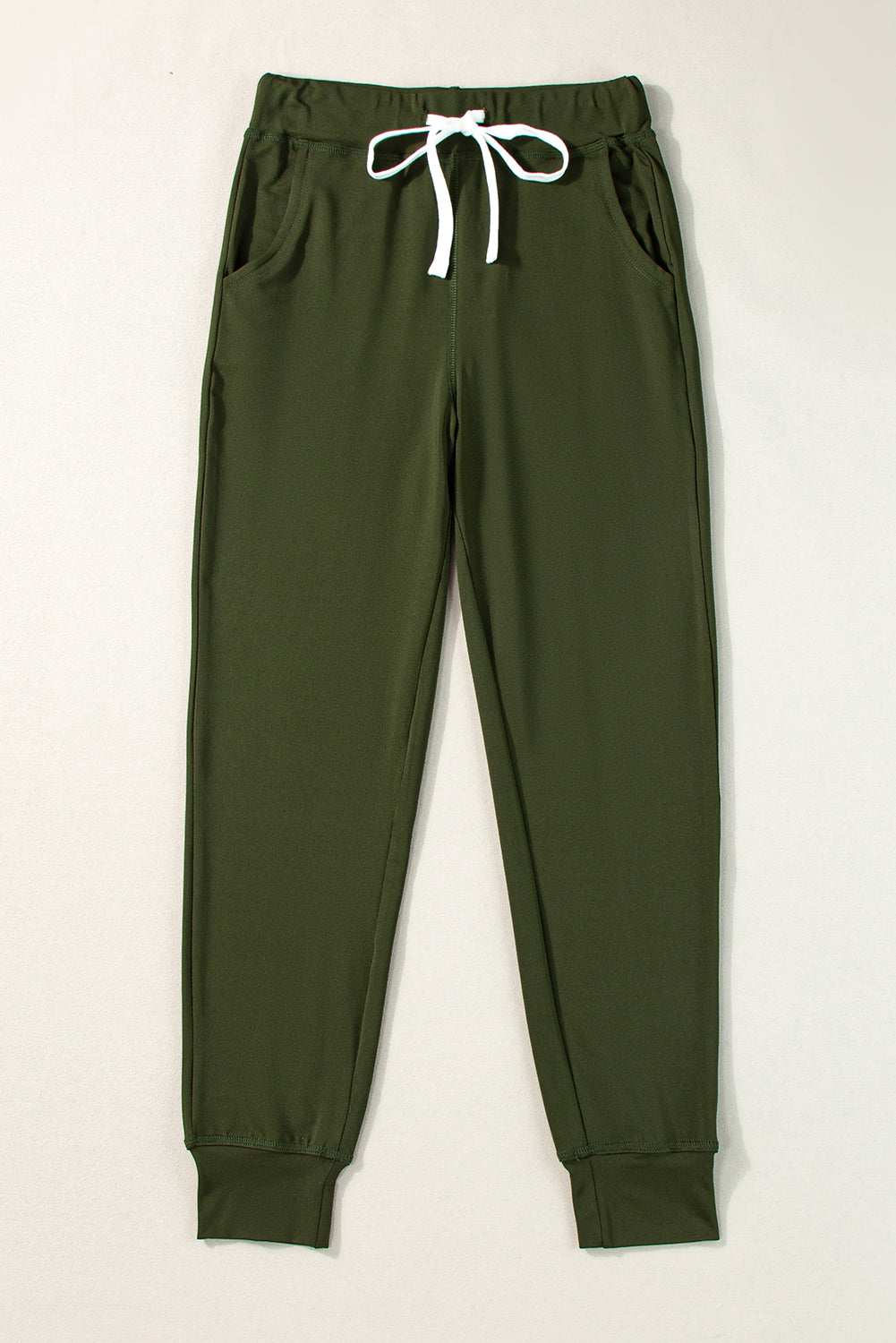 Pantalon de jogging vert mousse avec poches à la taille et cordon de serrage